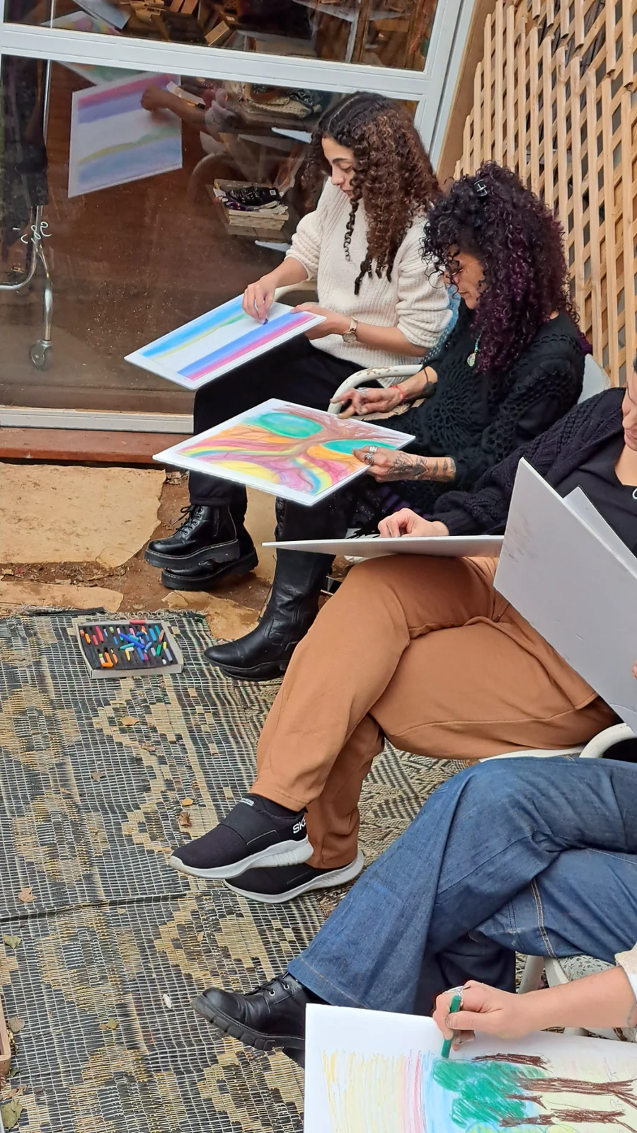 Participants working in color on personal pieces